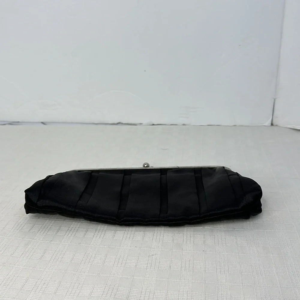 Carolina Herrera kiss lock black and silver clutch